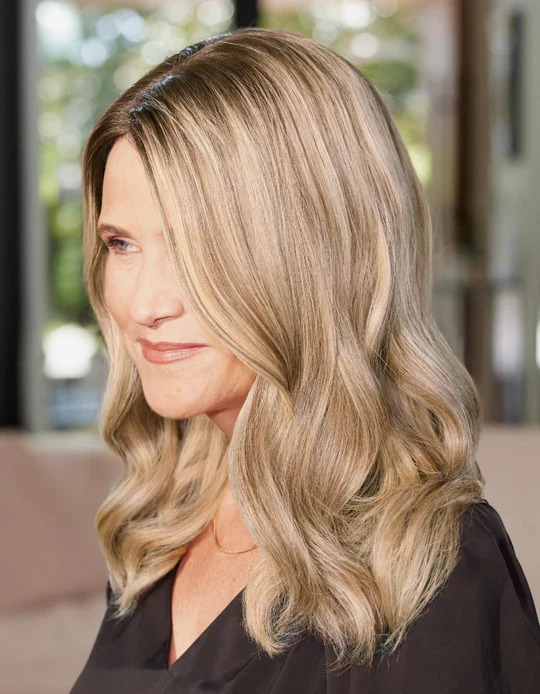 Woman with luxury Follea human hair wig by Daniel Alain